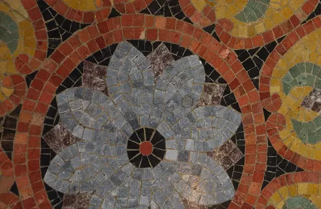 Photo of mosaic tile floors arranged in a floral pattern