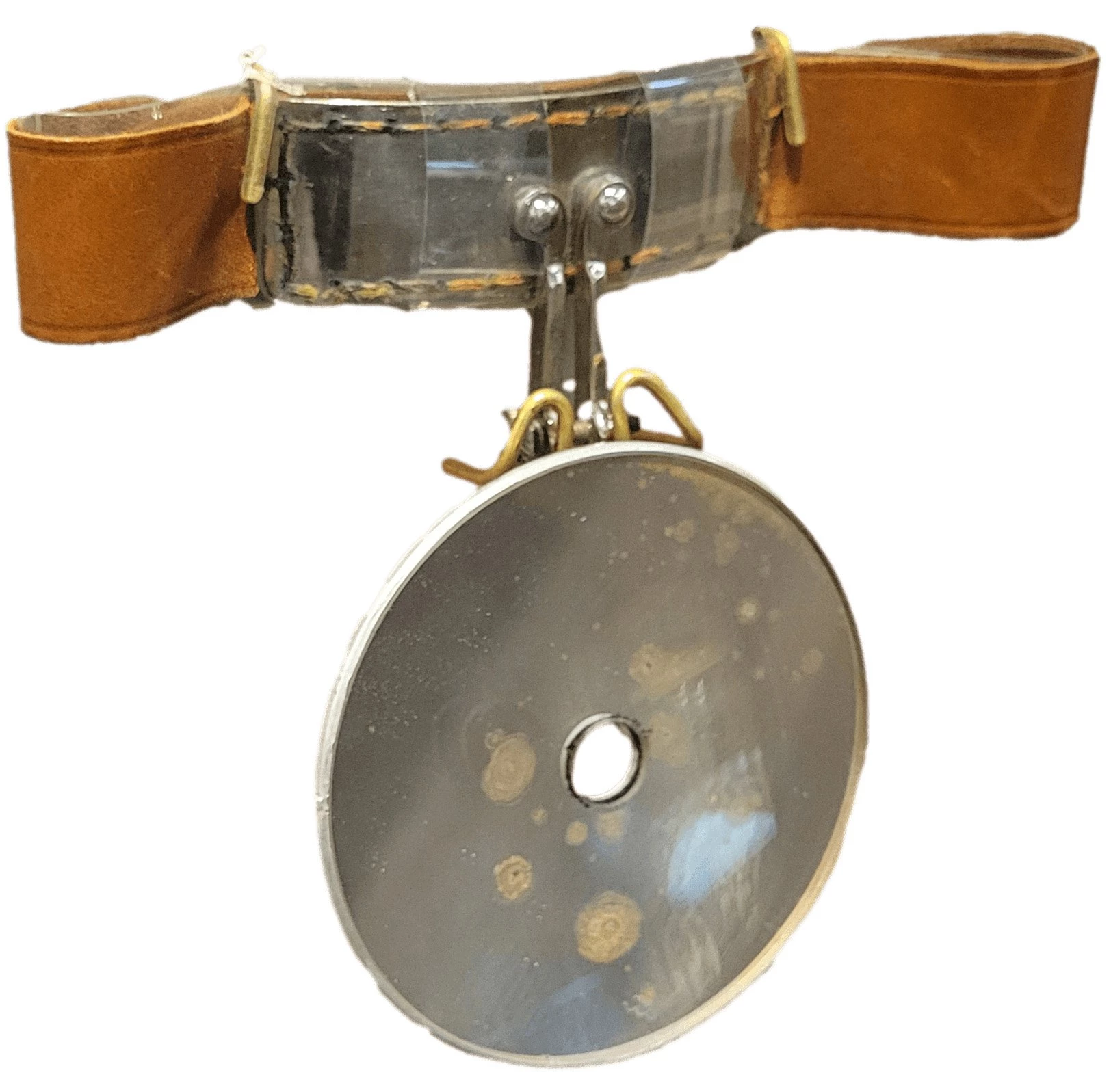 Brown leather belt with a metal rectangle at the center, stitched into the leather. Attatched to the rectangle is a round metal mirror.