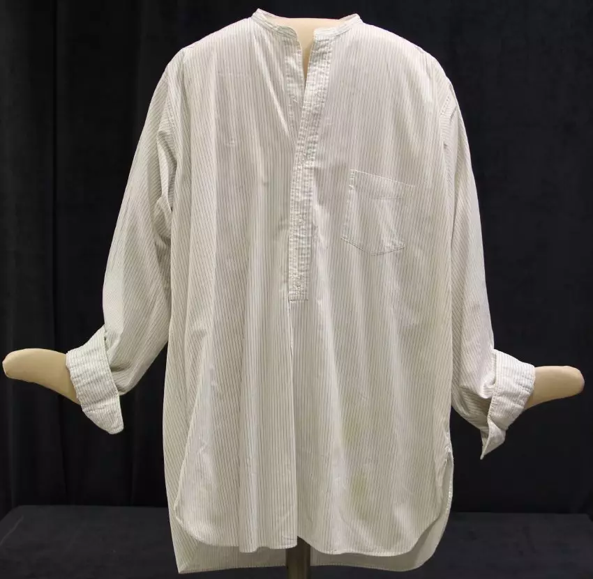 white collarless shirt with buttons that go halfway down