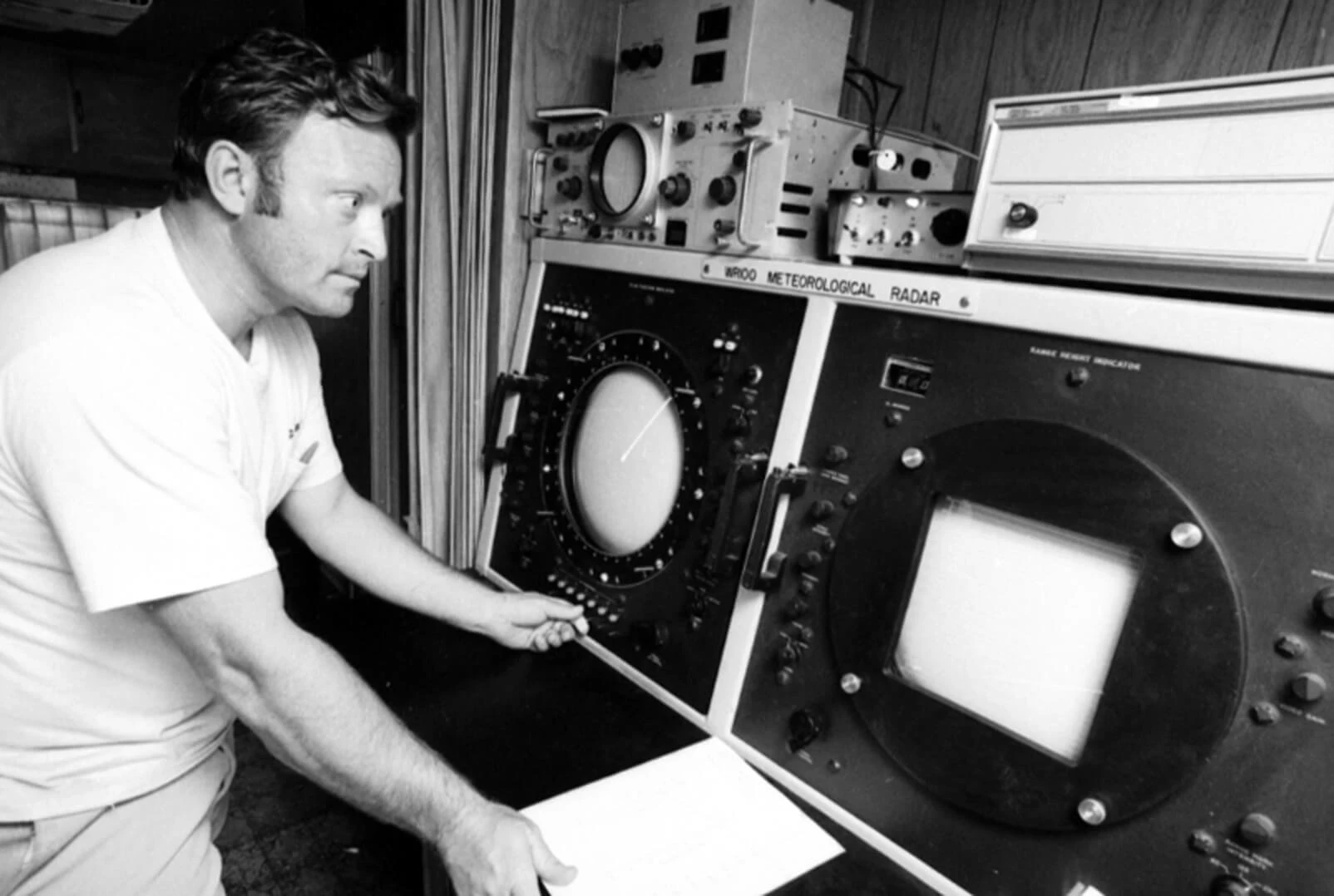 Curtis Smith, meteorologist for the cloud seeding project in McLean County, tracked cloud and plane movement using a sophisticated radar system.