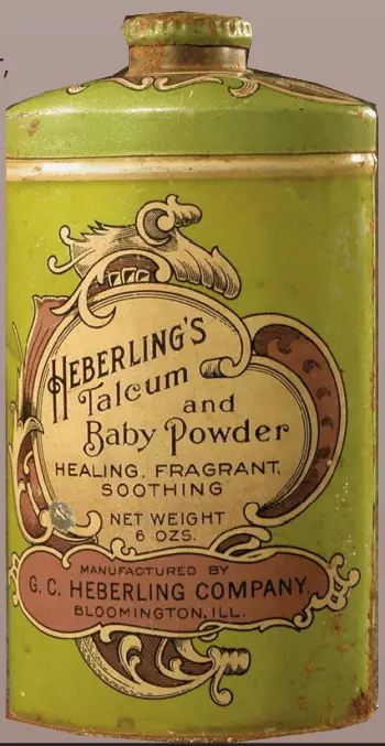 Photo of a green metal can labeled as Heberling's Talcum and Baby Powder.
