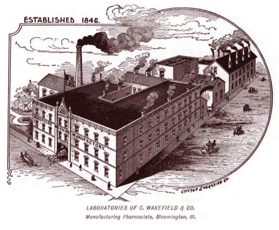 an illustration of a few factory buildings, one in the foreground is very large, and a smokestack with billowing smoke.