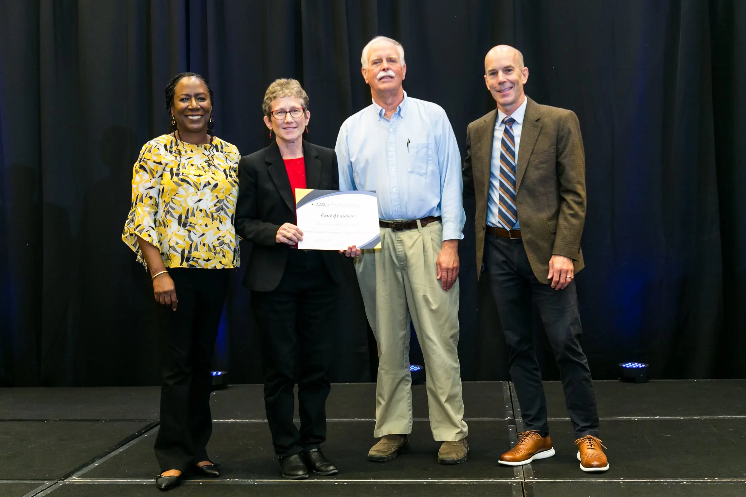 Mike and Susan pose with AASLH leadership.