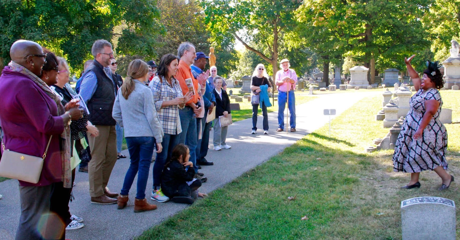 Group tours the cemetery walk