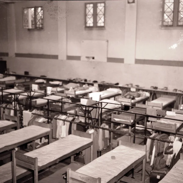 Illinois State Normal University’s Cook Hall gymnasium, seen here in September 1946, provided temporary housing to newly enrolled World War II veterans awaiting the completion of off-campus federal housing units.