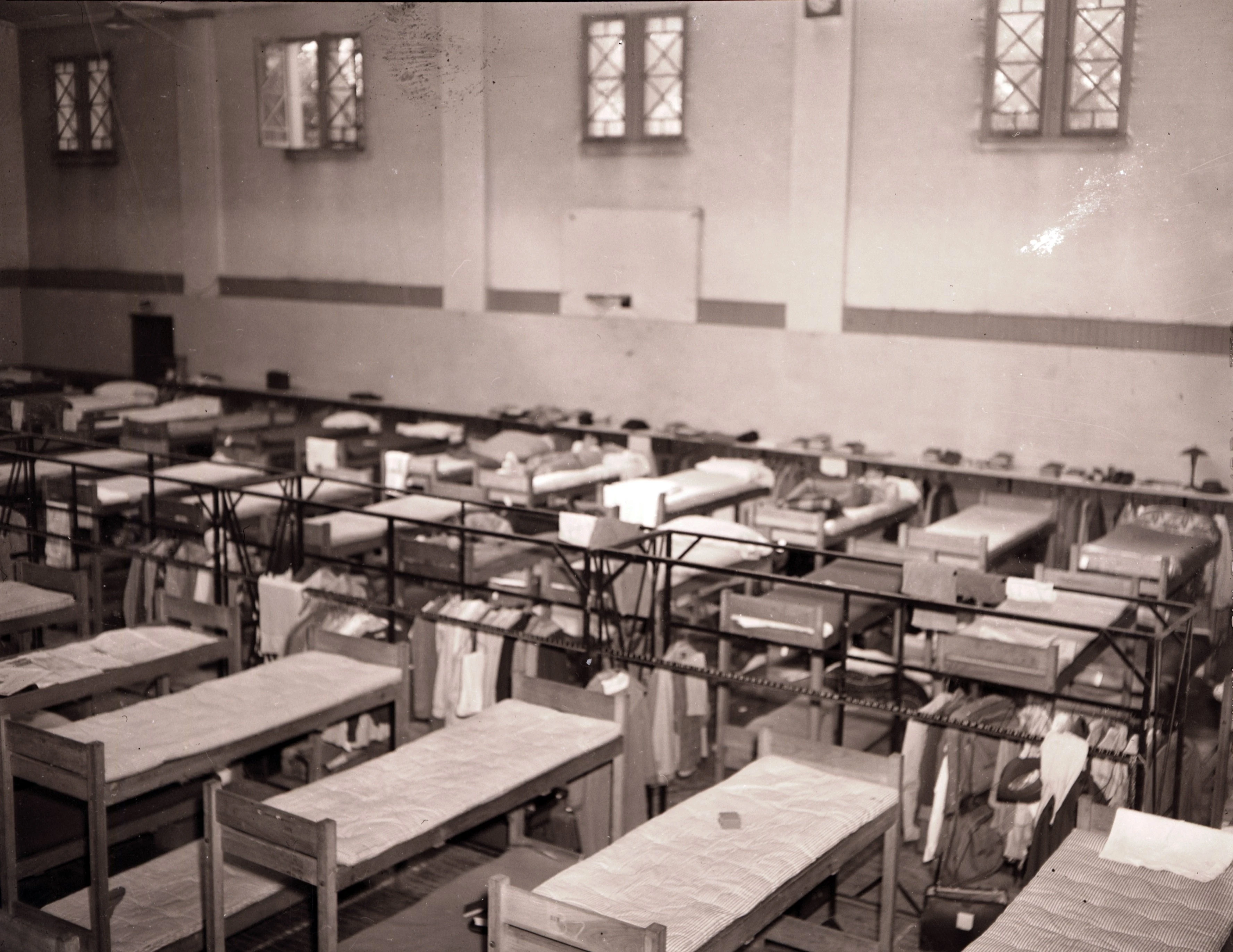 Illinois State Normal University’s Cook Hall gymnasium, seen here in September 1946, provided temporary housing to newly enrolled World War II veterans awaiting the completion of off-campus federal housing units.