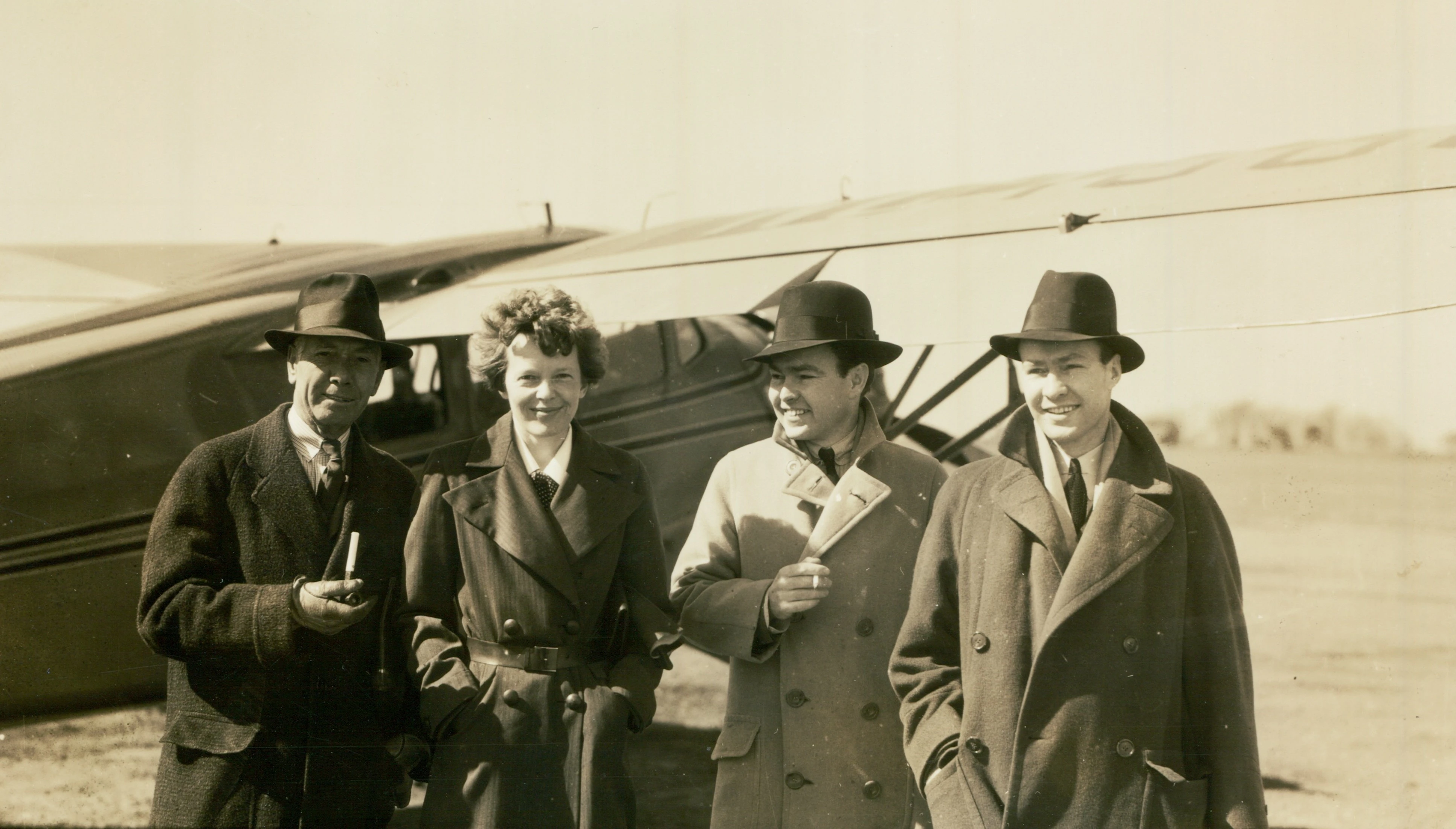 During her second visit to the Twin Cities, April 6-7, 1936, famed aviator Amelia Earhart visited the Bloomington Municipal Airport (now the Central Illinois Regional Airport), where she flew on The Pantagraph’s very own airplane, dubbed “Scoop.” Seen here, left to right, are Louis B. Merwin, Earhart, and Louis’ sons, Loring and Davis. At the time, Loring Merwin was president of the newspaper.