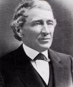 Black and white photograph of an older man, Jesse Fell, wearing a simple suit. He has a nice gaze, looking off into the distance, and a slight upward turn to his mouth