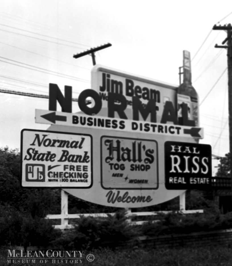 Welcome to Normal, Illinois.  Hall's Tog Shop, Normal State Bank, Realtor Hal Riss
