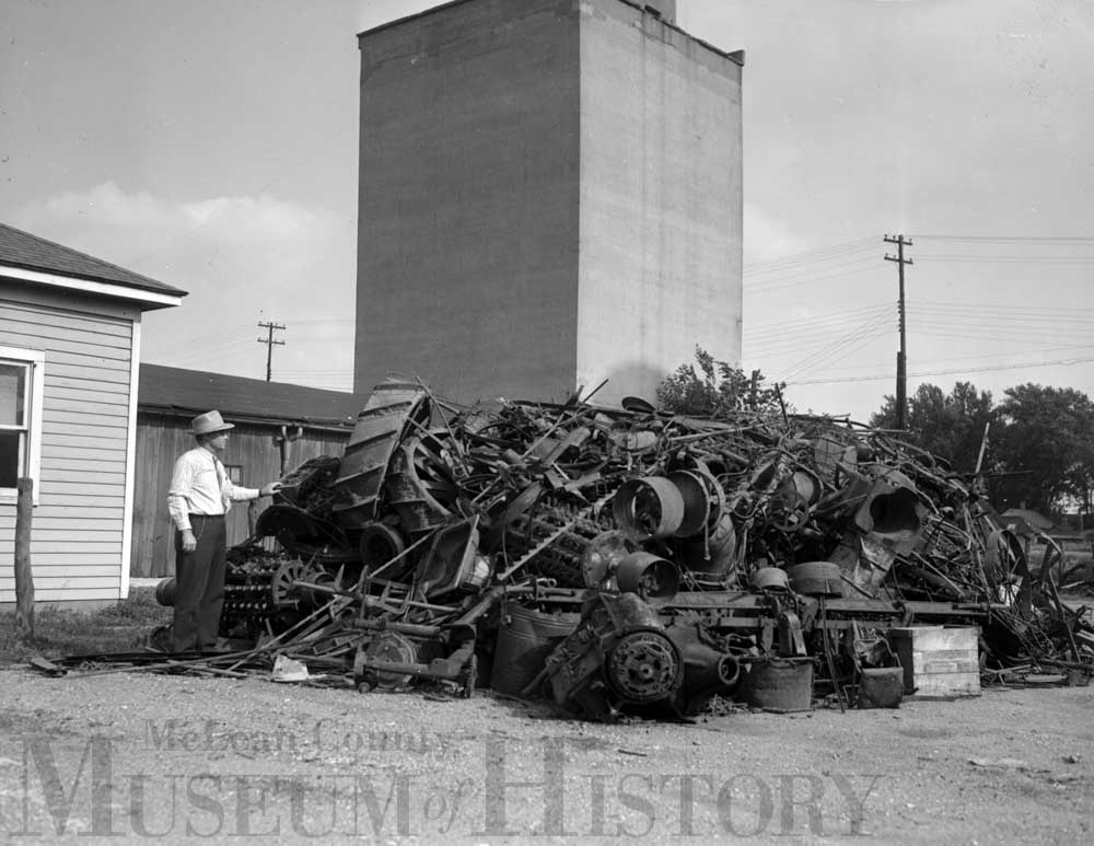 image of a pile of scrap outside an elevator in Colfax