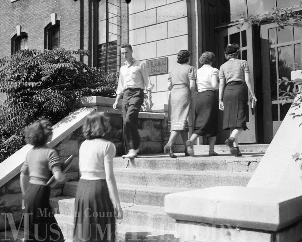 IWU students entering and leaving Hedding Hall, 1938.